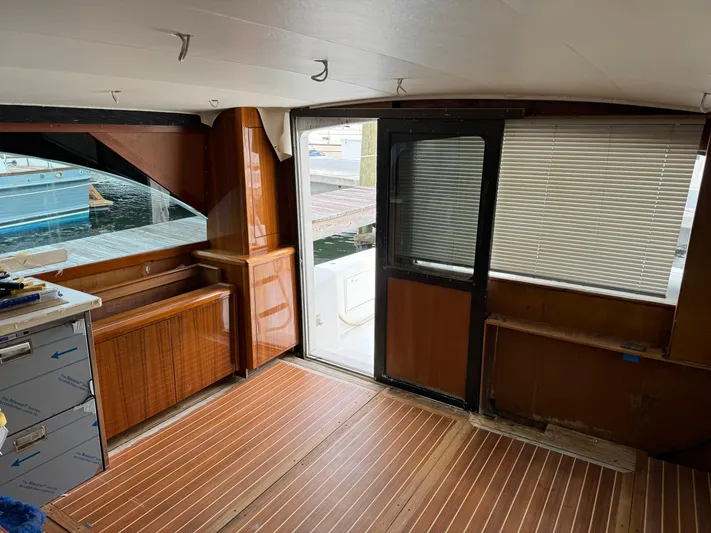  Yacht Photos Pics Interior of 1997 Ocean Yachts 40 Super Sport with wooden flooring and dock view.
