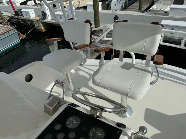  Yacht Photos Pics Captain's chairs on the 1997 Ocean Yachts 40 Super Sport at the marina.
