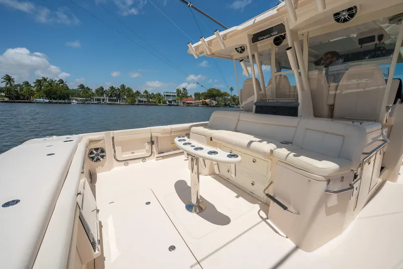  Yacht Photos Pics 2019 Grady-White Canyon 456 boat interior with seating and fishing setup.