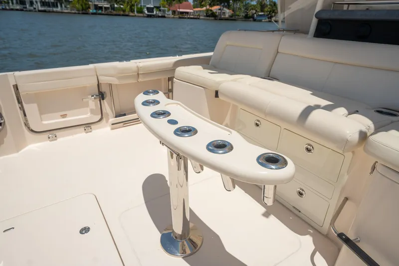  Yacht Photos Pics 2019 Grady-White Canyon 456 boat interior with rod holders and seating area.