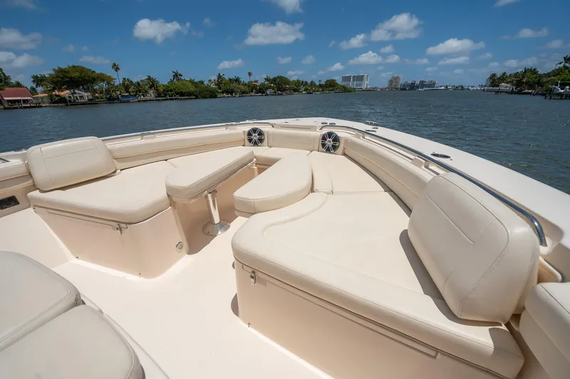  Yacht Photos Pics 2019 Grady-White Canyon 456 boat interior with spacious seating on a sunny day.
