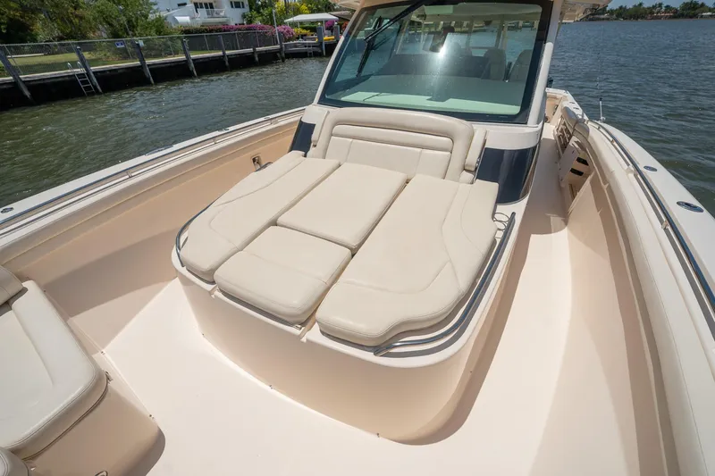  Yacht Photos Pics 2019 Grady-White Canyon 456 boat with spacious deck and comfortable seating.