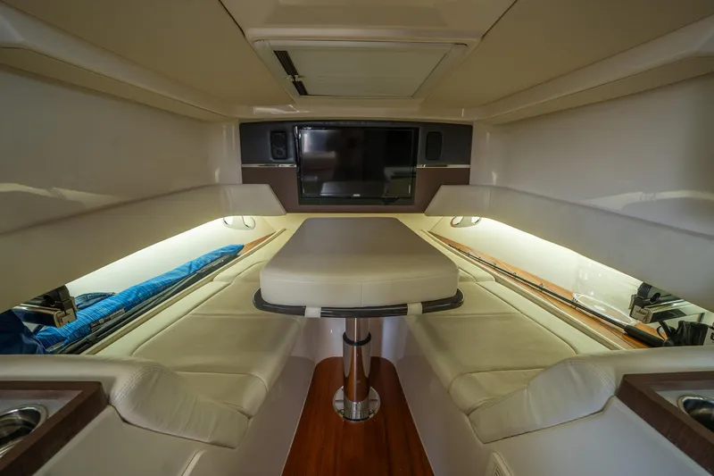  Yacht Photos Pics Luxurious interior of 2019 Grady-White Canyon 456 boat with plush seating and modern amenities.