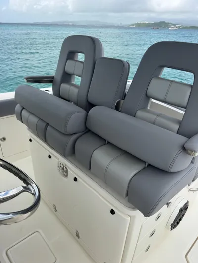  Yacht Photos Pics 2025 Boston Whaler 330 Outrage boat seats with ocean view.