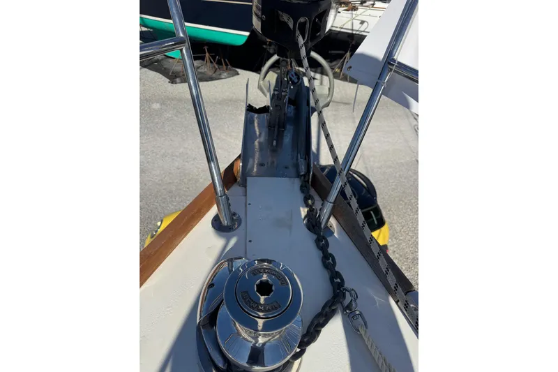 Lady Slipper Yacht Photos Pics Bow of 2005 Sabre 386 sailboat with anchor chain and winch.