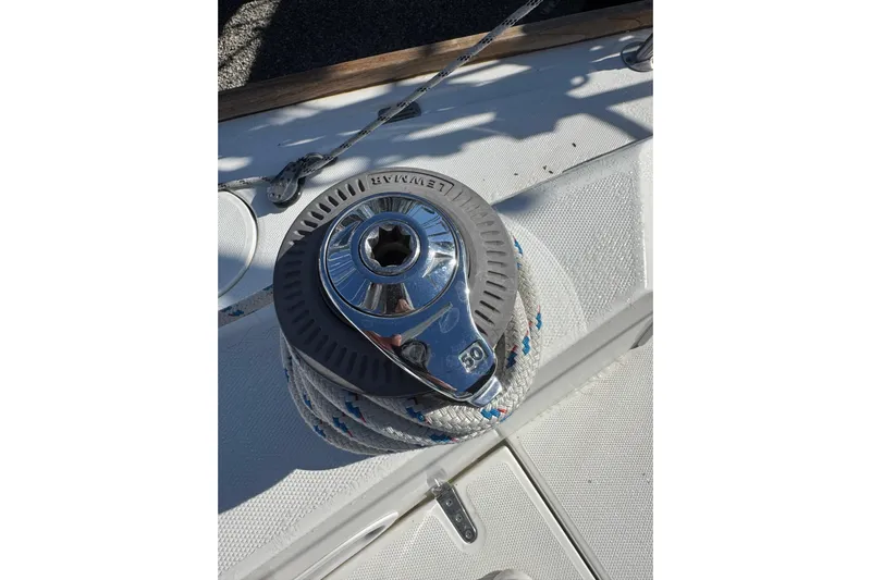 Lady Slipper Yacht Photos Pics Close-up of a winch on a 2005 Sabre 386 sailboat deck.