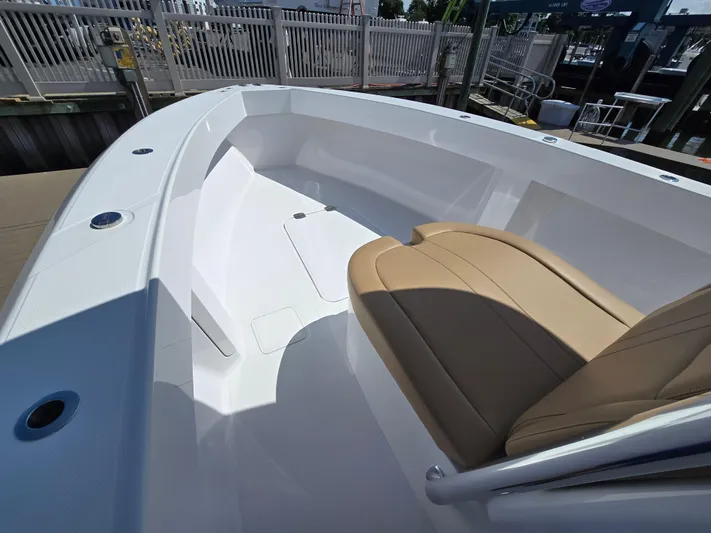 Yacht Photos Pics 2025 Bahama 35 Super Center Console boat interior with tan seating and sleek design.