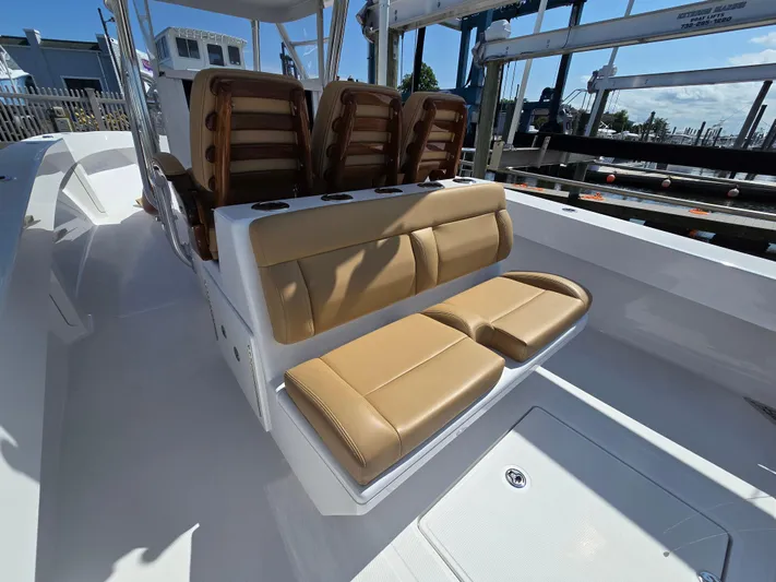  Yacht Photos Pics 2025 Bahama 35 Super Center Console with tan leather seating and sleek design.