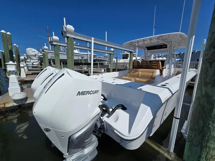  Yacht Photos Pics 2025 Bahama 35 Super Center Console boat docked with Mercury engines.