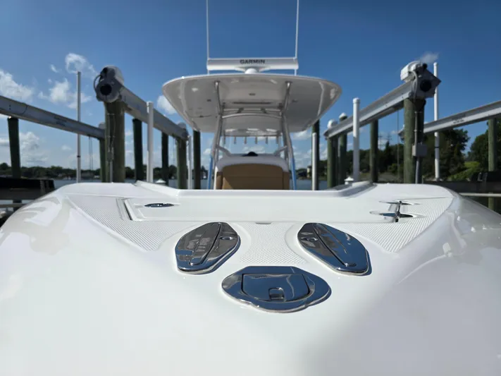  Yacht Photos Pics 2025 Bahama 35 Super Center Console boat docked under clear blue sky.