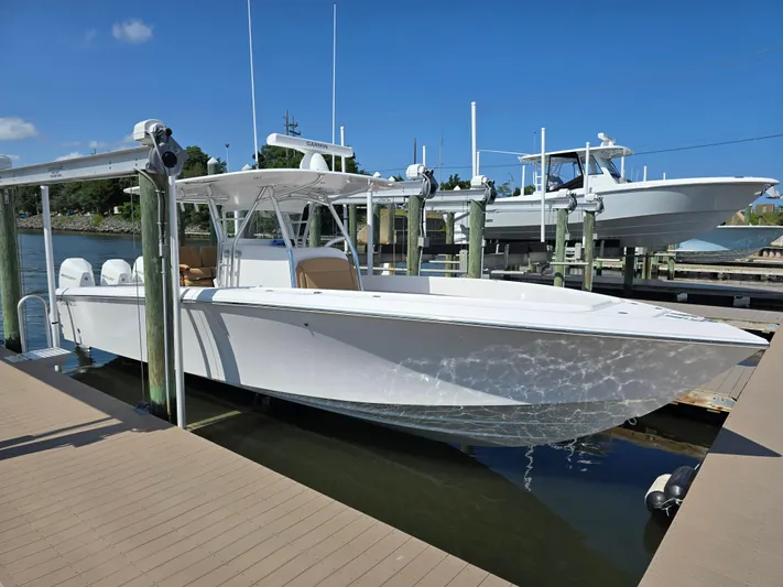  Yacht Photos Pics 2025 Bahama 35 Super Center Console boat docked at marina.