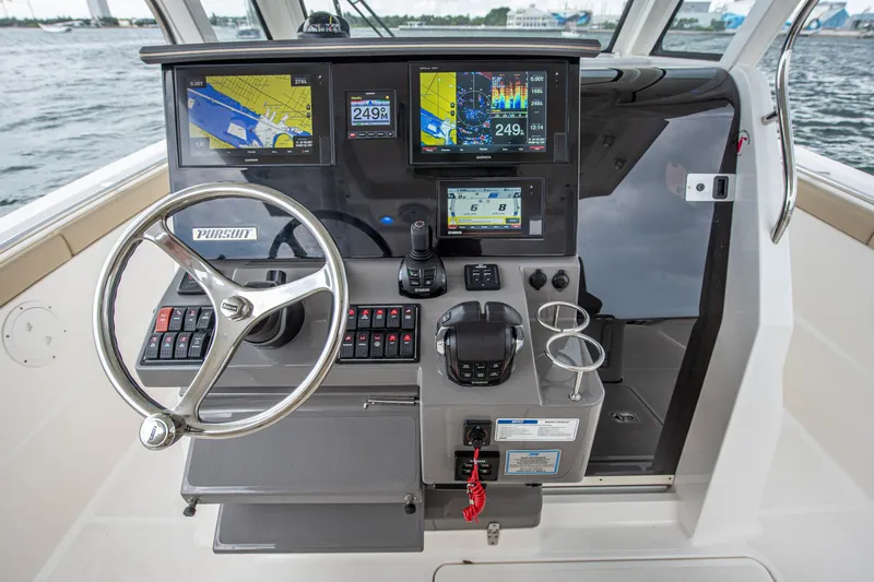 Southern Pass Yacht Photos Pics Helm of 2019 Pursuit S 328 Sport boat with advanced navigation displays.