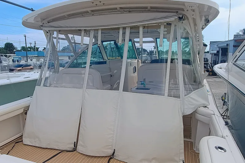 375-712 Used Yacht Photos Pics 2021 Grady-White Freedom 375 boat with enclosed cockpit and seating area.