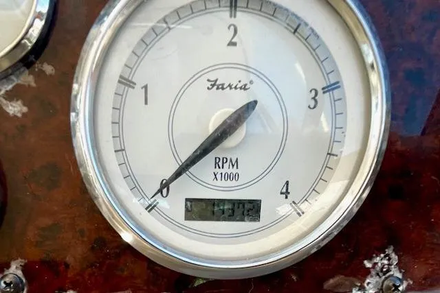 "just One Mohr" Yacht Photos Pics Tachometer of 2005 Regal Commodore 4260 showing RPM and digital display.