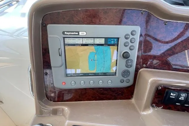 "just One Mohr" Yacht Photos Pics Raymarine navigation system on 2005 Regal Commodore 4260 yacht dashboard.