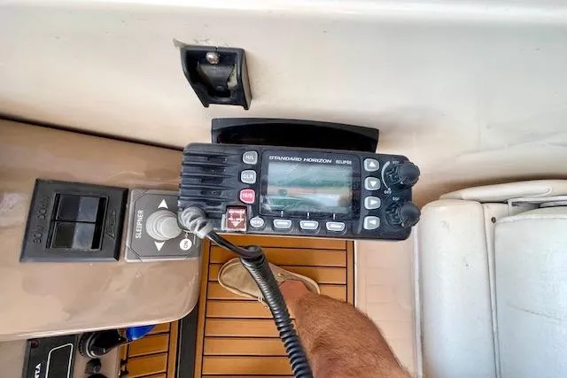 "just One Mohr" Yacht Photos Pics Radio equipment on a 2005 Regal Commodore 4260 boat dashboard.