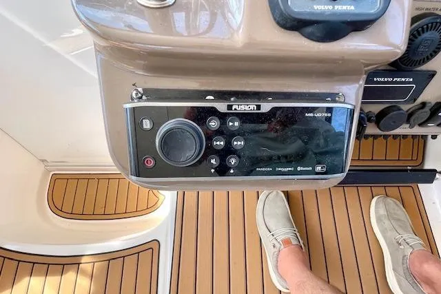 "just One Mohr" Yacht Photos Pics Control panel of a 2005 Regal Commodore 4260 boat with Fusion audio system.