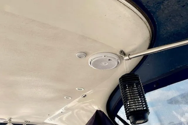 "just One Mohr" Yacht Photos Pics Ceiling of 2005 Regal Commodore 4260 with speaker and hanging lantern.