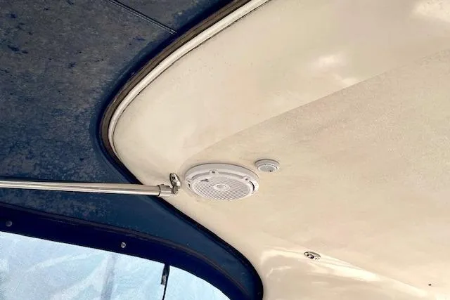 "just One Mohr" Yacht Photos Pics Ceiling speaker and rod in 2005 Regal Commodore 4260 boat interior.