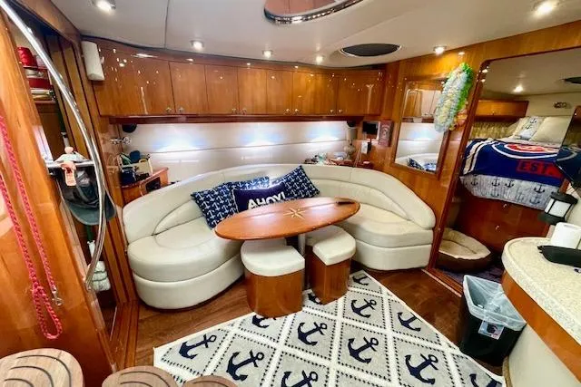 "just One Mohr" Yacht Photos Pics Luxurious interior of 2005 Regal Commodore 4260 yacht with elegant seating and nautical decor.