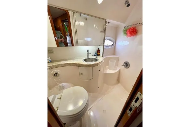 "just One Mohr" Yacht Photos Pics Luxurious bathroom in 2005 Regal Commodore 4260 yacht with modern amenities.