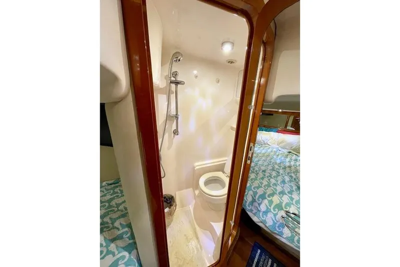 "just One Mohr" Yacht Photos Pics 2005 Regal Commodore 4260 yacht bathroom with shower and toilet.