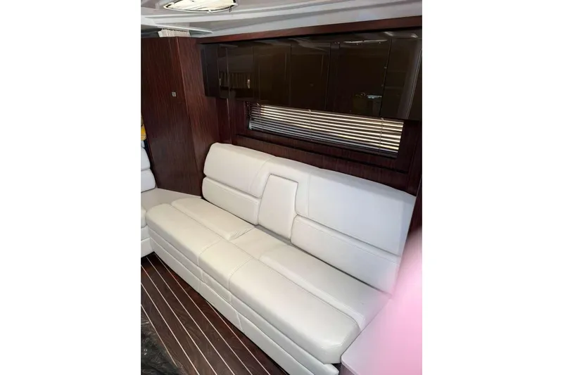  Yacht Photos Pics Luxurious interior of 2018 Monterey 335 Sport Yacht with white leather seating.