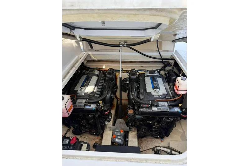  Yacht Photos Pics Engine compartment of 2018 Monterey 335 Sport Yacht with dual engines visible.
