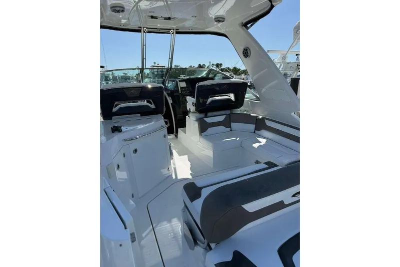  Yacht Photos Pics 2018 Monterey 335 Sport Yacht interior with sleek seating and modern design.