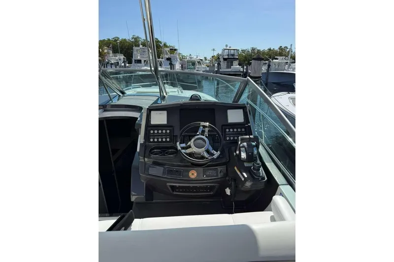 Yacht Photos Pics 2018 Monterey 335 Sport Yacht helm with modern controls and steering wheel.