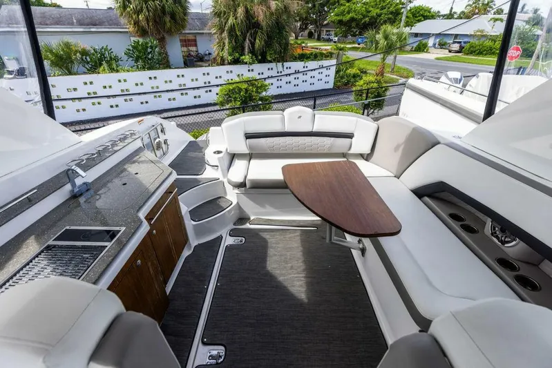  Yacht Photos Pics Luxurious 2020 Four Winns H350 boat interior with seating and dining area.