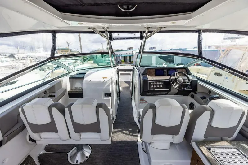  Yacht Photos Pics Interior of 2020 Four Winns H350 boat with modern seating and dashboard.