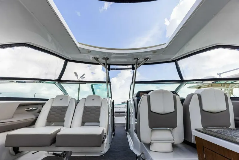  Yacht Photos Pics Interior of 2020 Four Winns H350 boat with luxurious seating and open roof.