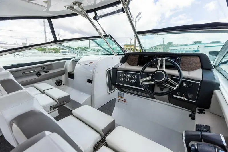  Yacht Photos Pics 2020 Four Winns H350 boat interior with modern dashboard and seating.