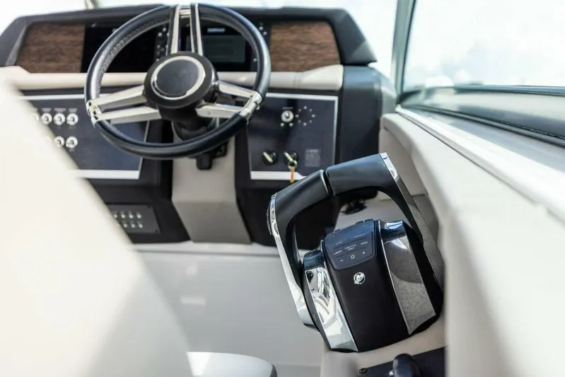  Yacht Photos Pics 2020 Four Winns H350 boat helm with modern steering wheel and controls.