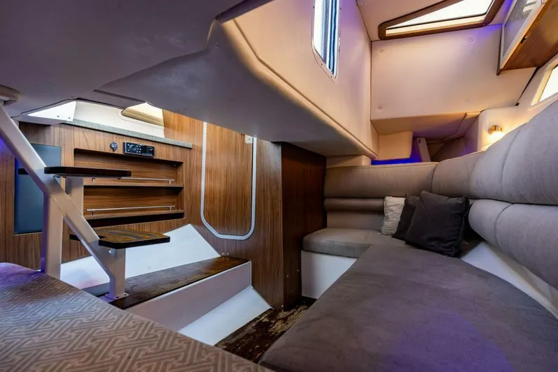  Yacht Photos Pics Interior of 2020 Four Winns H350 boat with modern seating and wooden accents.