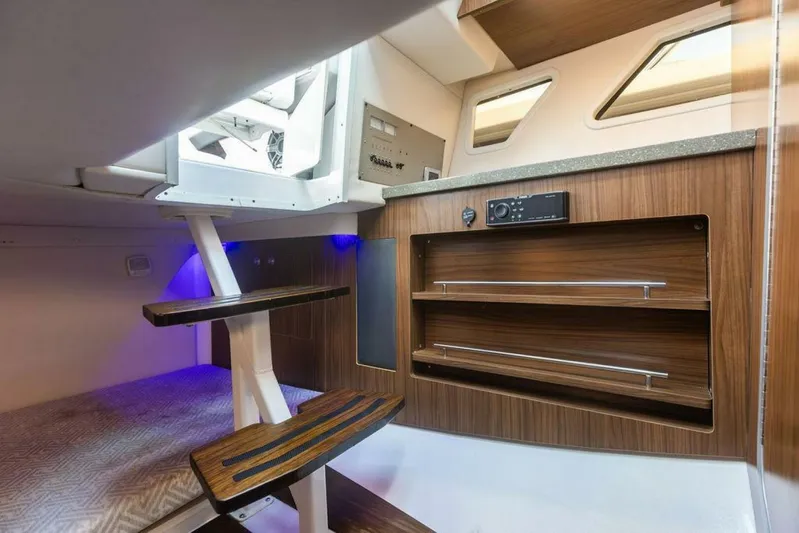  Yacht Photos Pics Interior of 2020 Four Winns H350 boat with wooden shelves and modern design.
