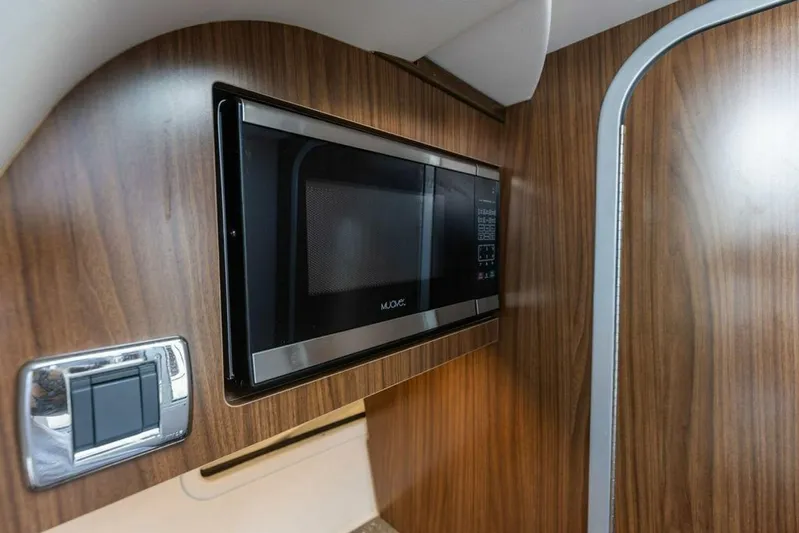  Yacht Photos Pics Modern kitchen area in 2020 Four Winns H350 boat with built-in microwave.