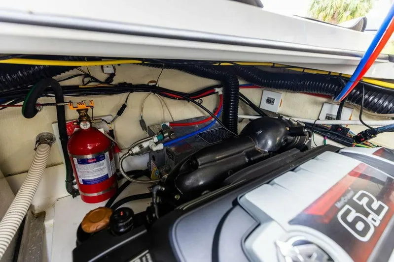  Yacht Photos Pics Engine compartment of 2020 Four Winns H350 boat with visible fire extinguisher and wiring.