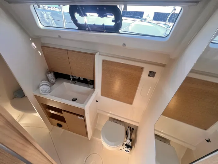 348 Sea Yacht Photos Pics Modern bathroom interior of 2026 Hanse 348 yacht, featuring sink and toilet.
