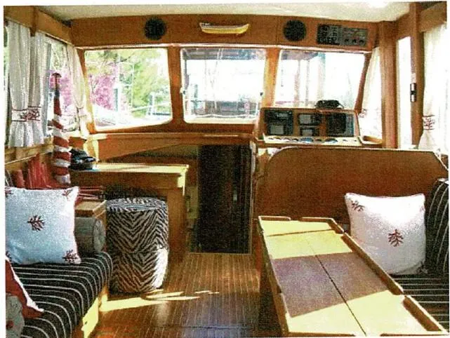Tatosh Yacht Photos Pics Interior of 1998 Grand Banks 43 Eastbay FB yacht with wood finish and cozy seating.
