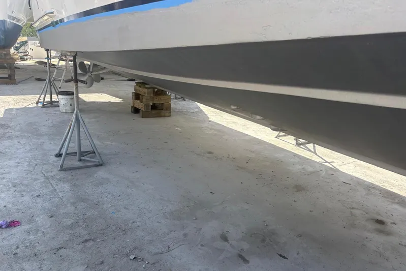 Tatosh Yacht Photos Pics 1998 Grand Banks 43 Eastbay FB yacht on stands, showing hull and propeller.