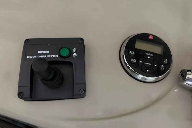  Yacht Photos Pics Control panel of 2006 Sea Ray 40 Sundancer with bow thruster and Clarion audio system.