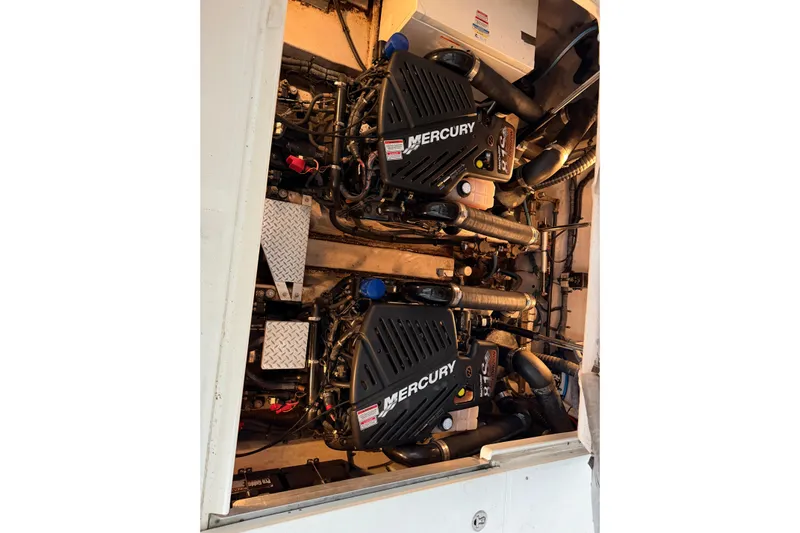  Yacht Photos Pics Engine compartment of 2006 Sea Ray 40 Sundancer with twin Mercury engines.