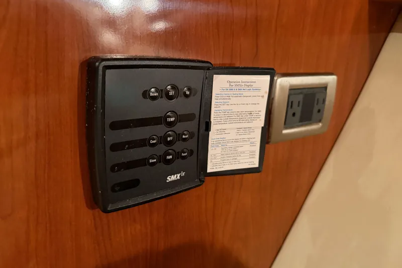  Yacht Photos Pics Control panel on 2006 Sea Ray 40 Sundancer yacht interior, featuring SMXir system.