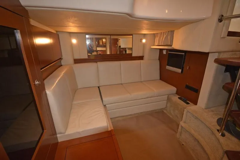  Yacht Photos Pics Interior of 2006 Sea Ray 40 Sundancer yacht with cozy seating and TV.