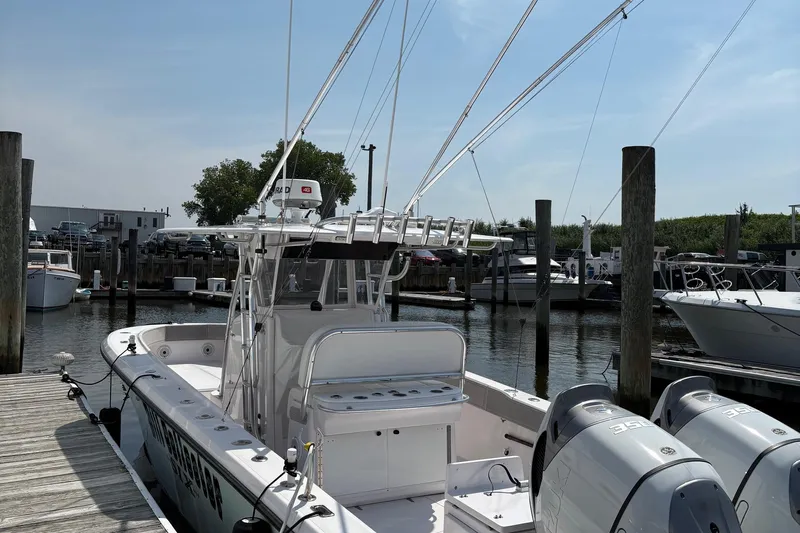  Yacht Photos Pics 2009 Venture 34 CC boat docked at marina with twin engines.