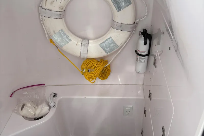  Yacht Photos Pics Interior of 2009 Venture 34 CC boat with life preserver and fire extinguisher.