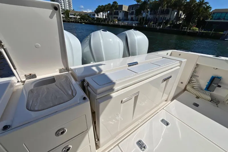 Perseverance Yacht Photos Pics 2019 Pursuit S 368 Sport boat deck with storage and triple engines.