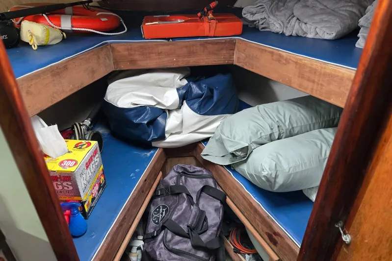 Sunrise Yacht Photos Pics Interior of a 1995 MDI Downeast boat with storage and supplies.